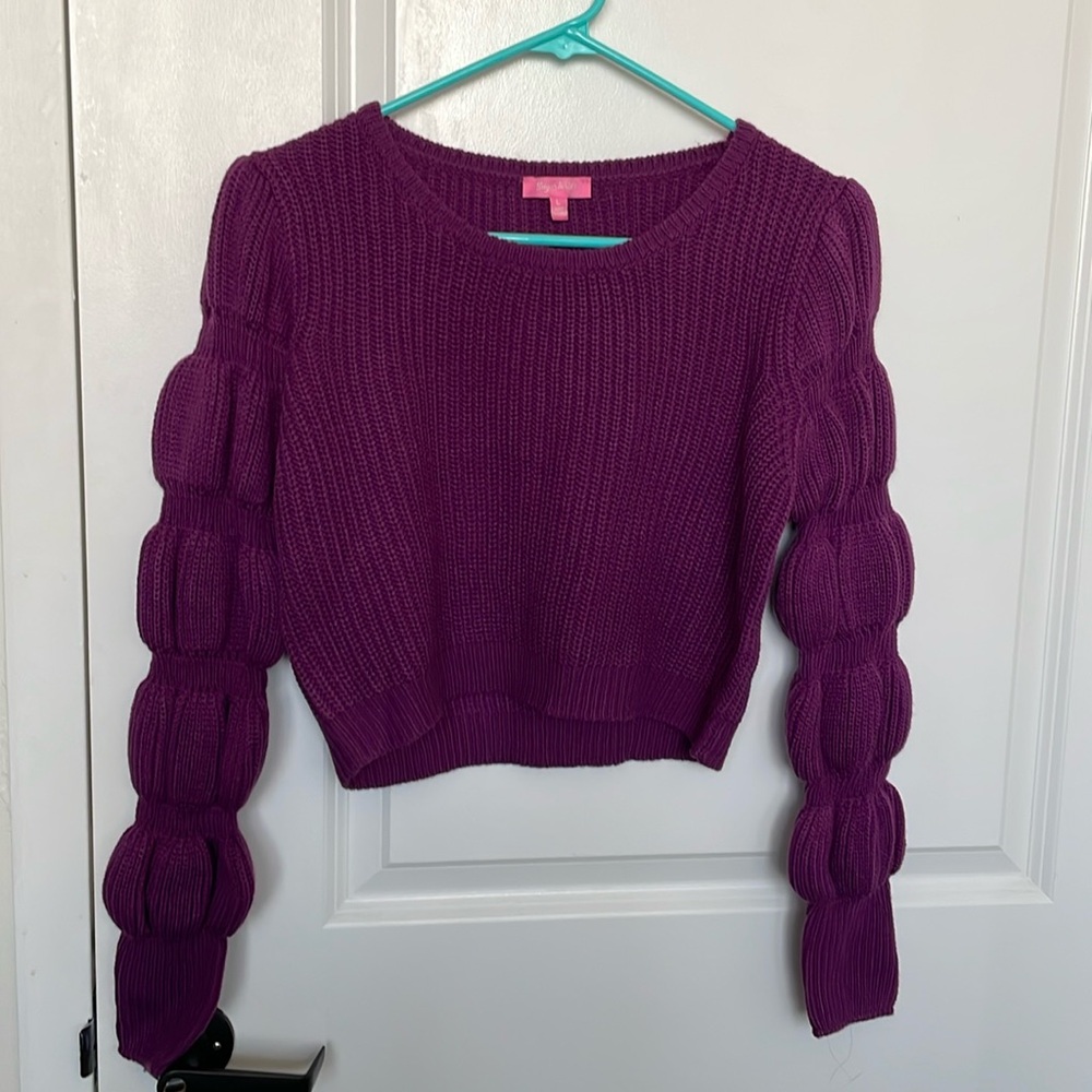 A pretty purple sweater.